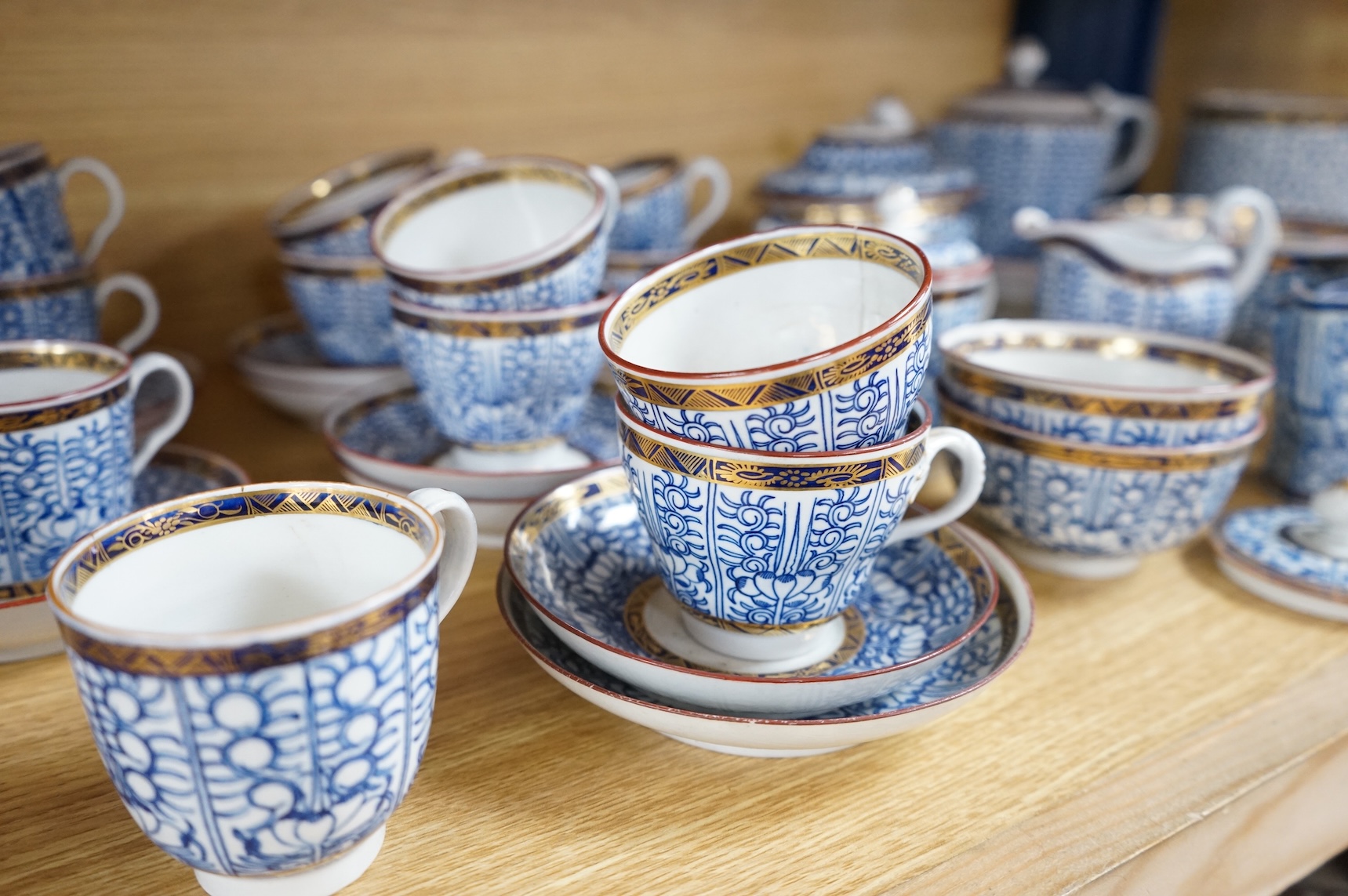 A collection of Worcester Royal Lily pattern tea and coffee wares, late 18th/early 19th century, largest 22cm wide